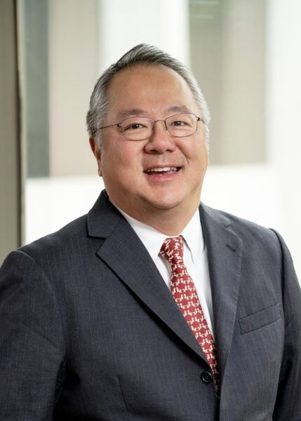 Headshot of Eric Cheng.
