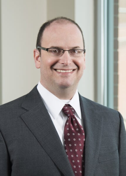 Headshot of Daniel Tranen.