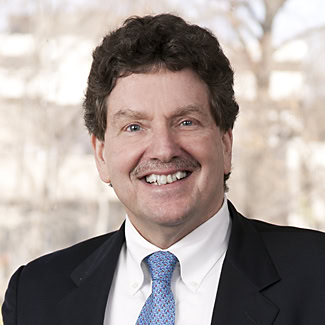 Headshot of Alan Friedberg.