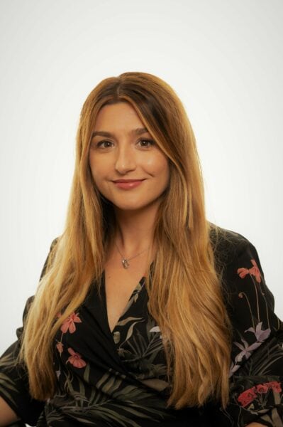 Headshot of Aura Radu.