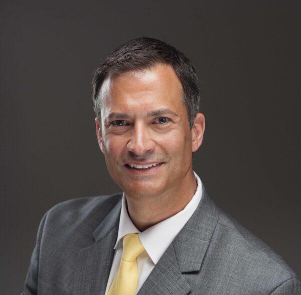 Headshot of Shayne Bevilacqua.