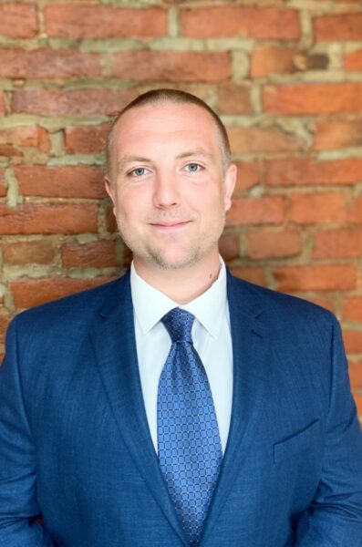 Headshot of Nate Hartman.