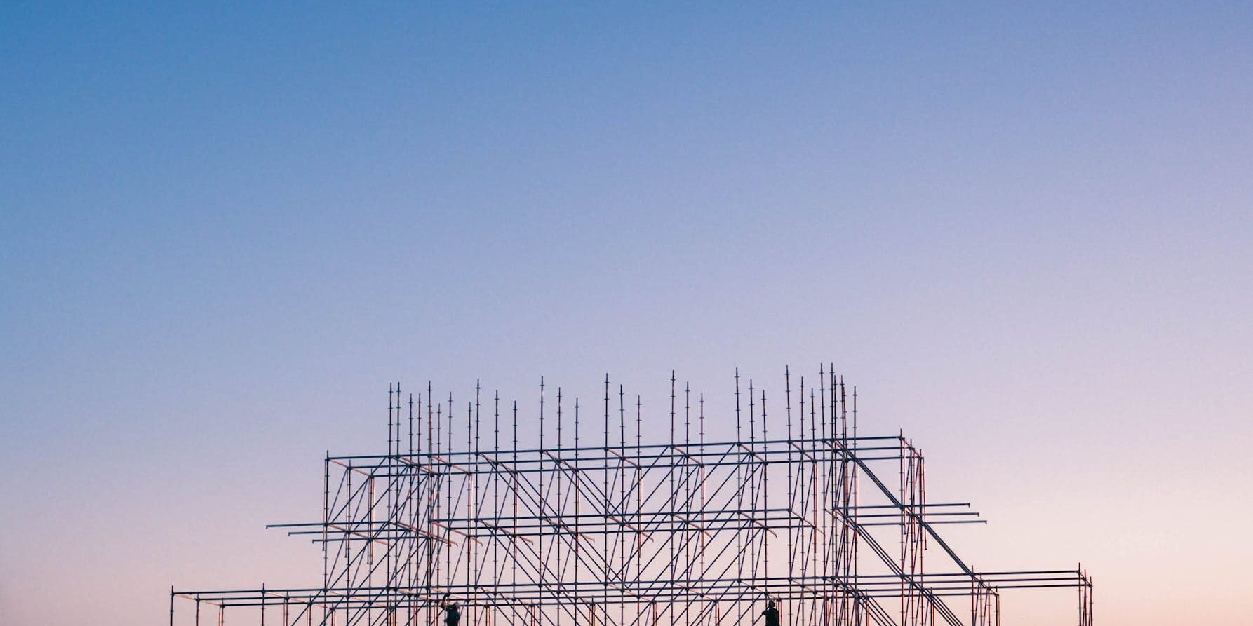 photo of people on building under construction