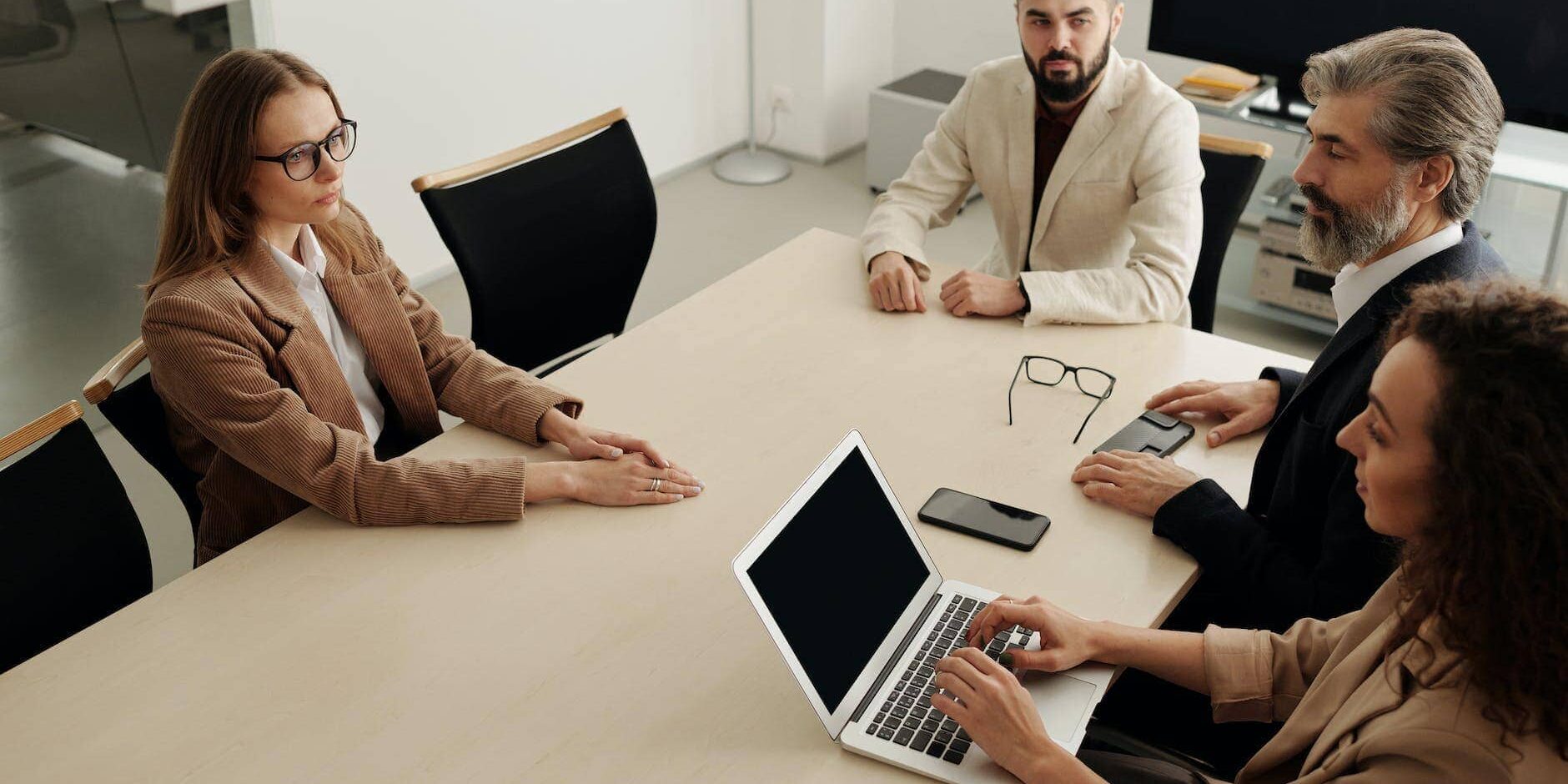 man and woman sitting at table