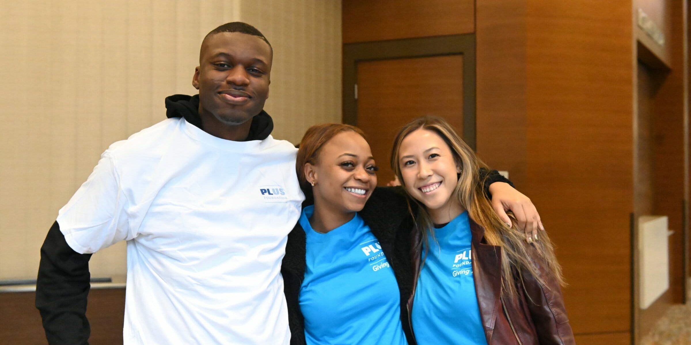 A group shot of 3 PLUS Foundation Members in 2022