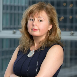 Headshot of Carla Varriale-Barker.