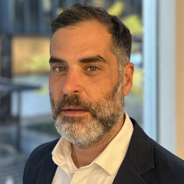 Headshot of Dennis Van Dina