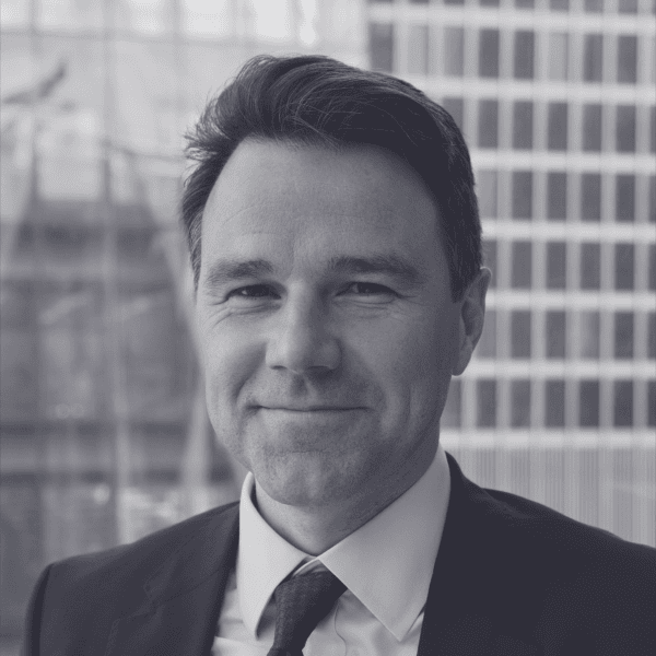 Black and white headshot of James Kench.