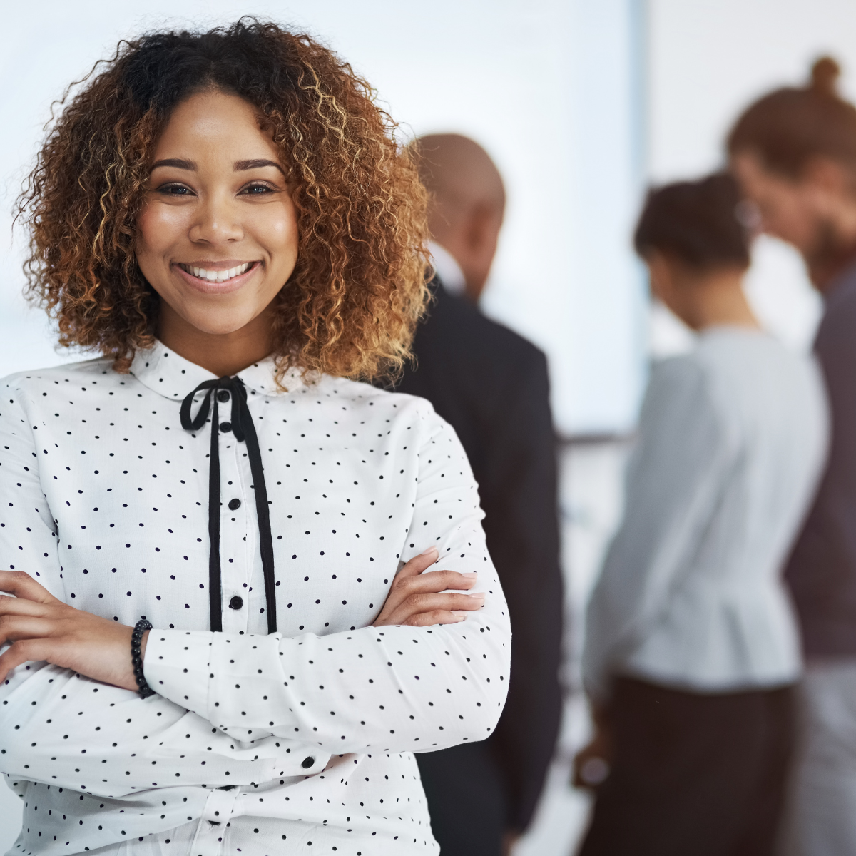 Image of a young professional crossing her arms