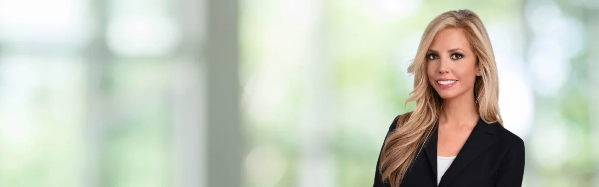 Headshot of Andrea DeField.