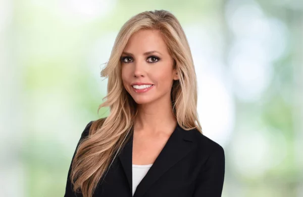 Headshot of Andrea DeField.