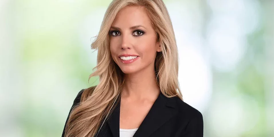 Headshot of Andrea DeField.